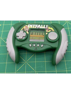 Pitfall Handheld Electronic LCD Video Game by Excalibur Model 482 Tested Works